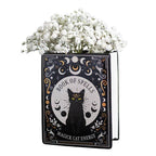 Vase en forme de livre de magie du chat noir