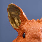 Lapin économe, résine polyuréthane orange, 21 x 11 x 16 cm