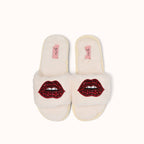 Paar Pantoffeln/Lippenbroschen