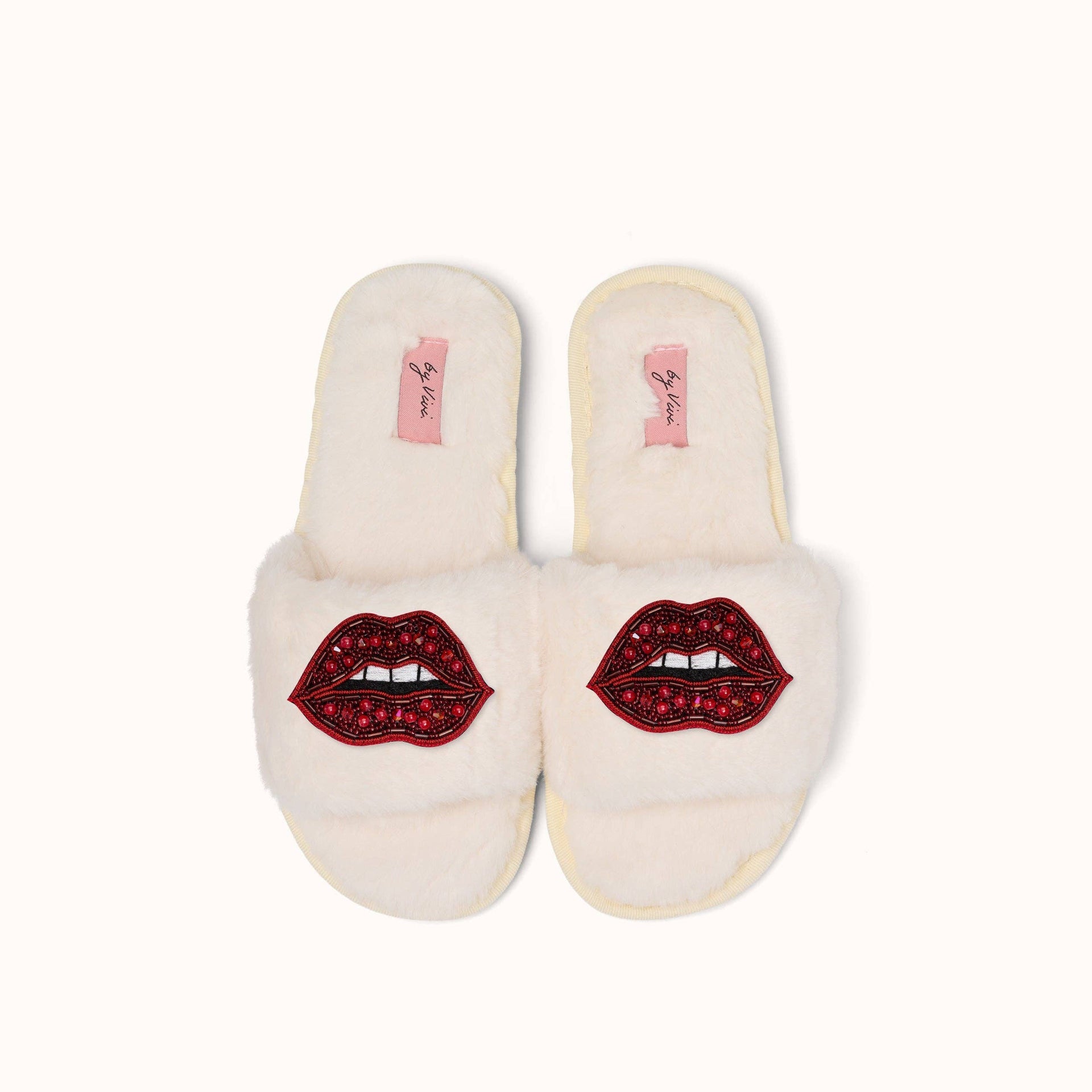 Paar Pantoffeln/Lippenbroschen