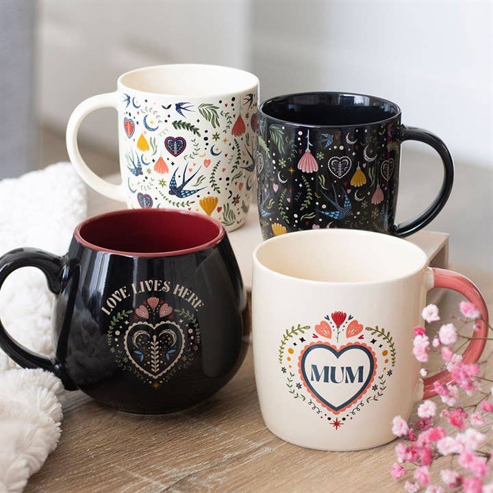 Folk Heart Mug "Love Lives Here"