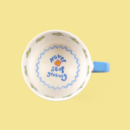 “Never Stop Growing” Duck Mug