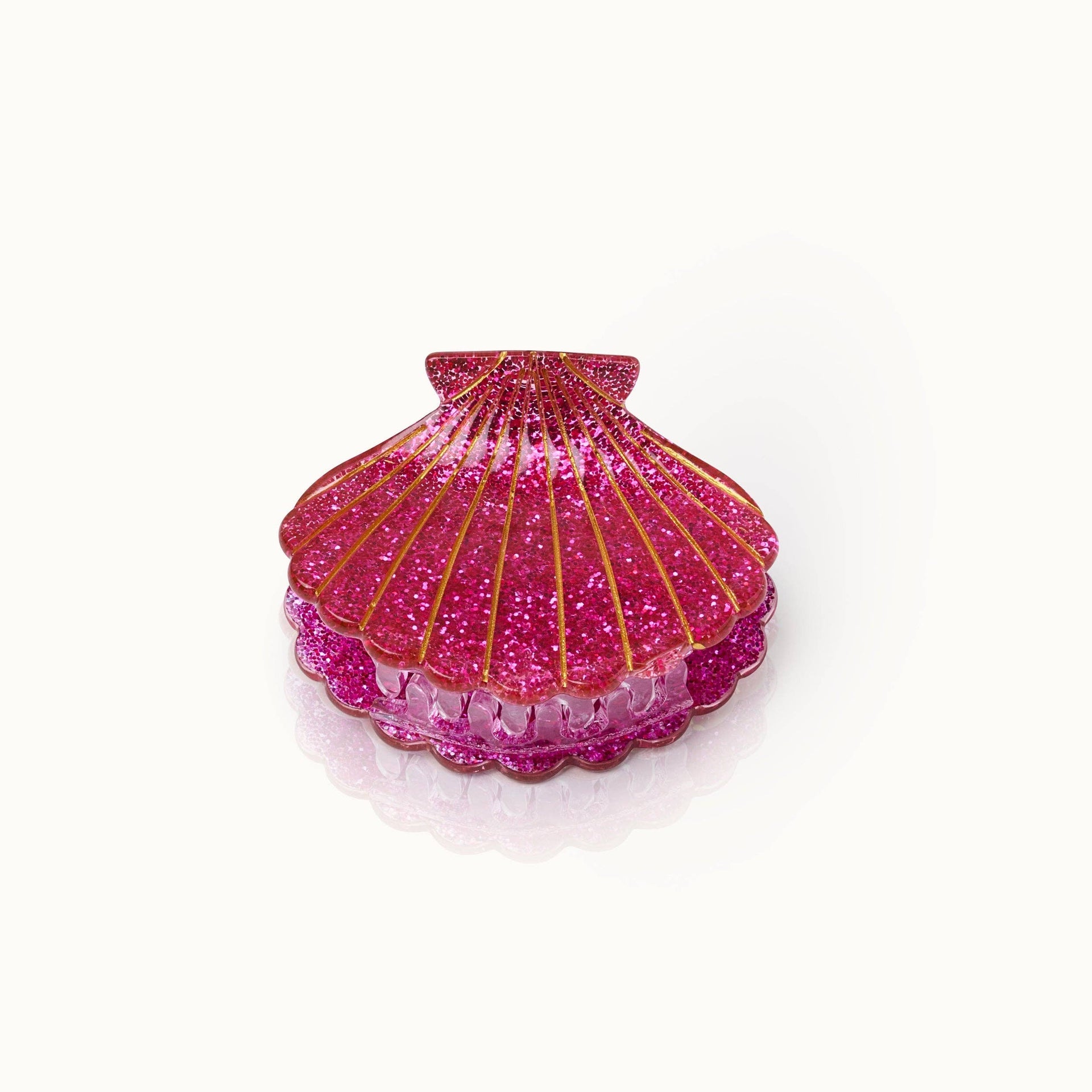 Glitzernde rosa Muschelhaarspange