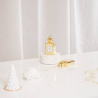 Regalo de diseño – boule de noel bouteille de parfum 