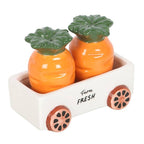 Salières et poivrières en forme de carottes dans un chariot | Design e regali originali