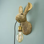 Hasi Wandleuchte, goldfarbenes Polyurethanharz, 22 x 19 x 46 cm
