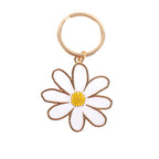 Schlüsselanhänger aus Emaille mit Gänseblümchenblume