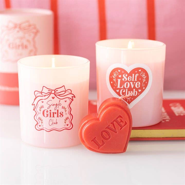 Red heart-shaped Valentine's Day candle
