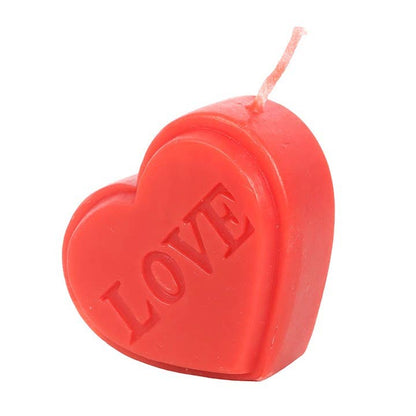 Red heart-shaped Valentine's Day candle
