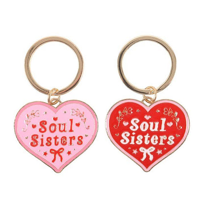 Pair of heart-shaped keychains for sisters at heart