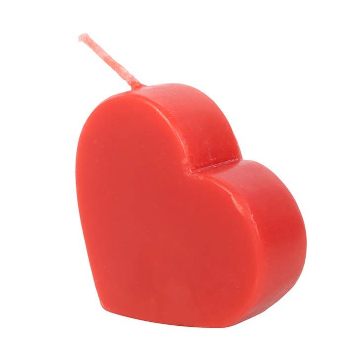 Red heart-shaped Valentine's Day candle