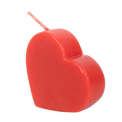 Red heart-shaped Valentine's Day candle