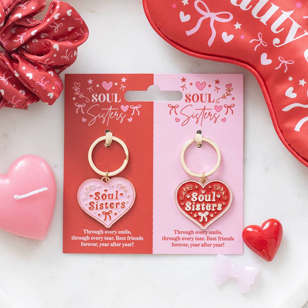 Pair of heart-shaped keychains for sisters at heart