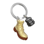 Design-lahja – porte cles chaussure de randonnee metalmorphose