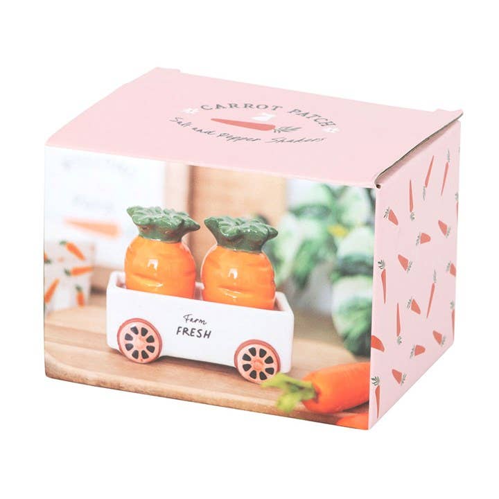 Salières et poivrières en forme de carottes dans un chariot | Design e regali originali