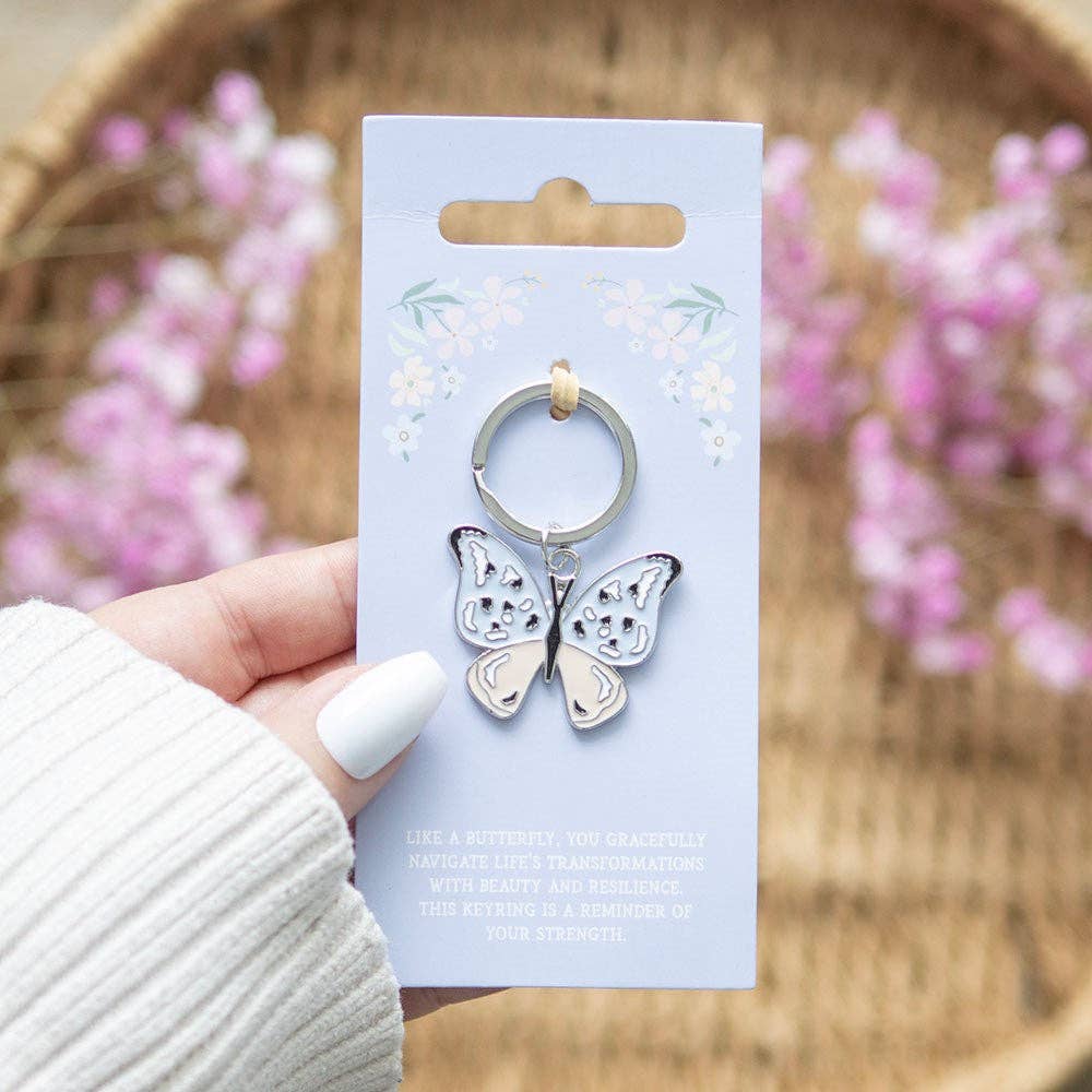 Schlüsselanhänger mit blauem und silbernem Schmetterling