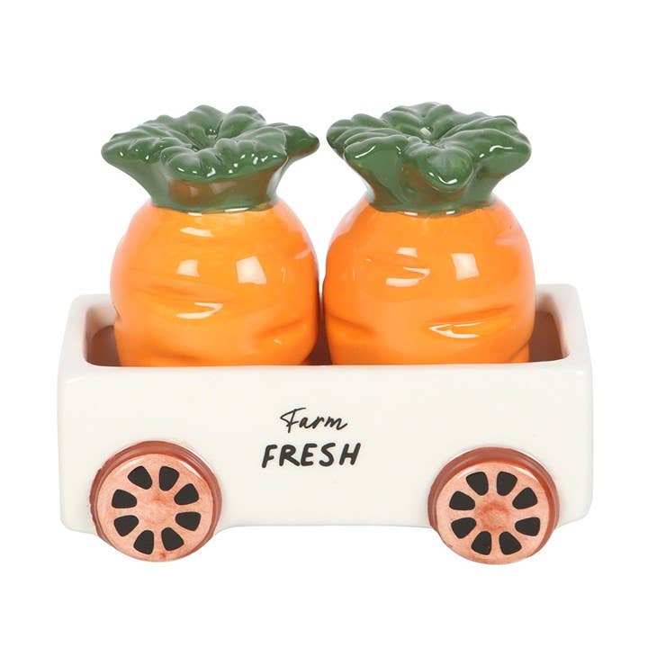Salières et poivrières en forme de carottes dans un chariot | Design e regali originali