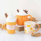 Tasse d'automne crème citrouille avec couvercle