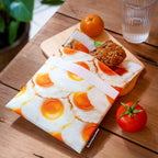 Sac à Encas Anti Tache Œuf au Plat Helio Ferretti Vue 1