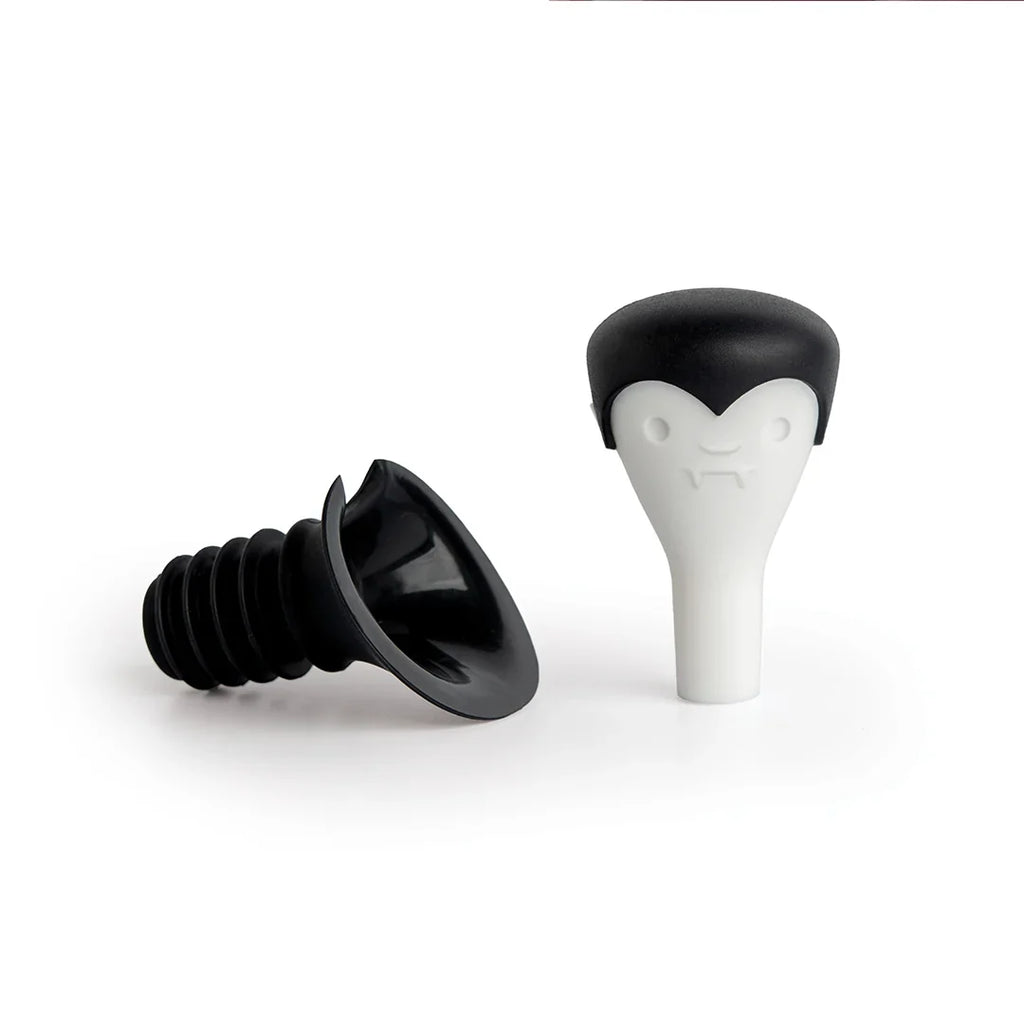 Count Corkula bottle stoppers have vampire fangs and black caps, perfect for wine enthusiasts.