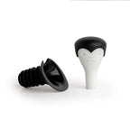 Count Corkula bottle stoppers have vampire fangs and black caps, perfect for wine enthusiasts.
