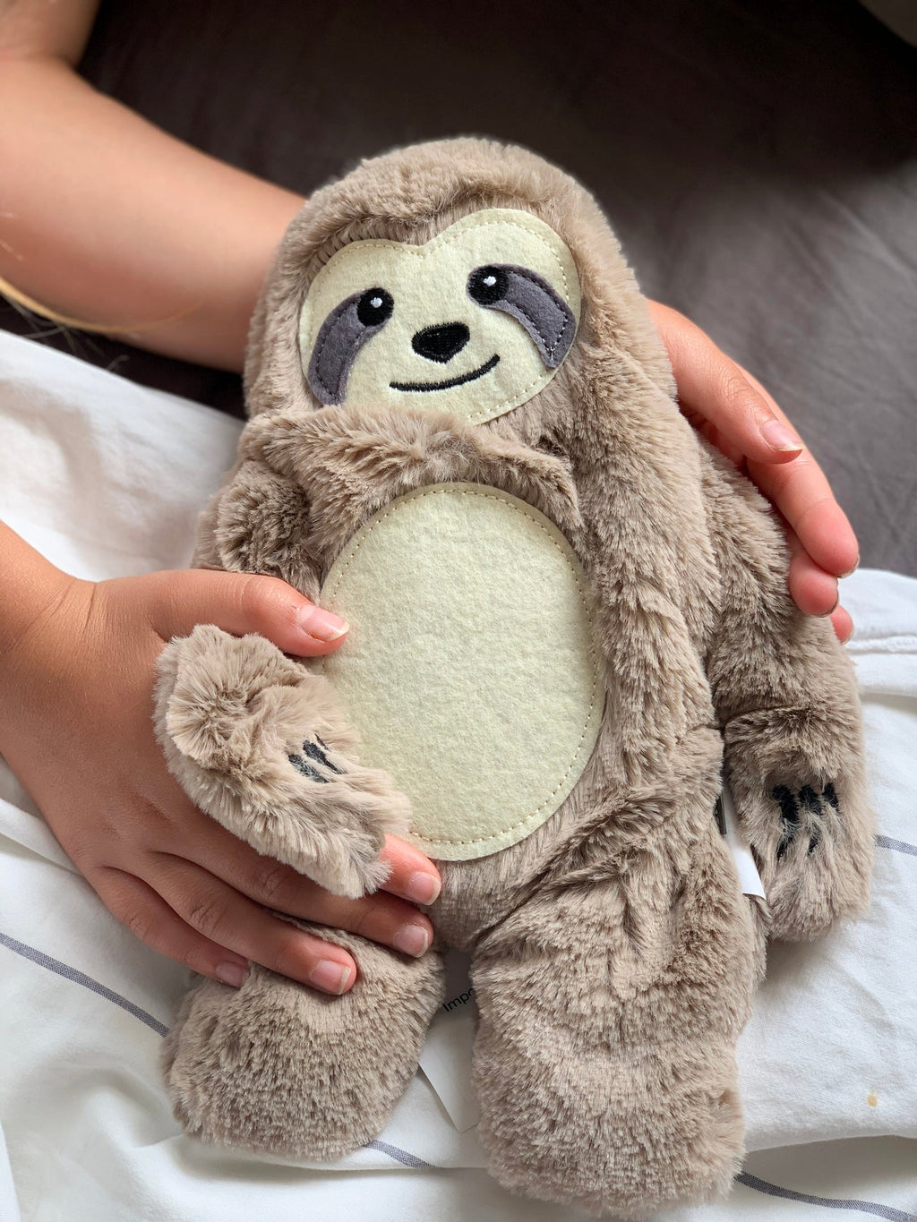 Bouillotte Huggable Paresseux – Bitten