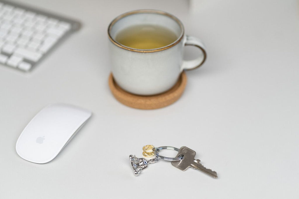 Designcadeau – porte cles yoga troika 