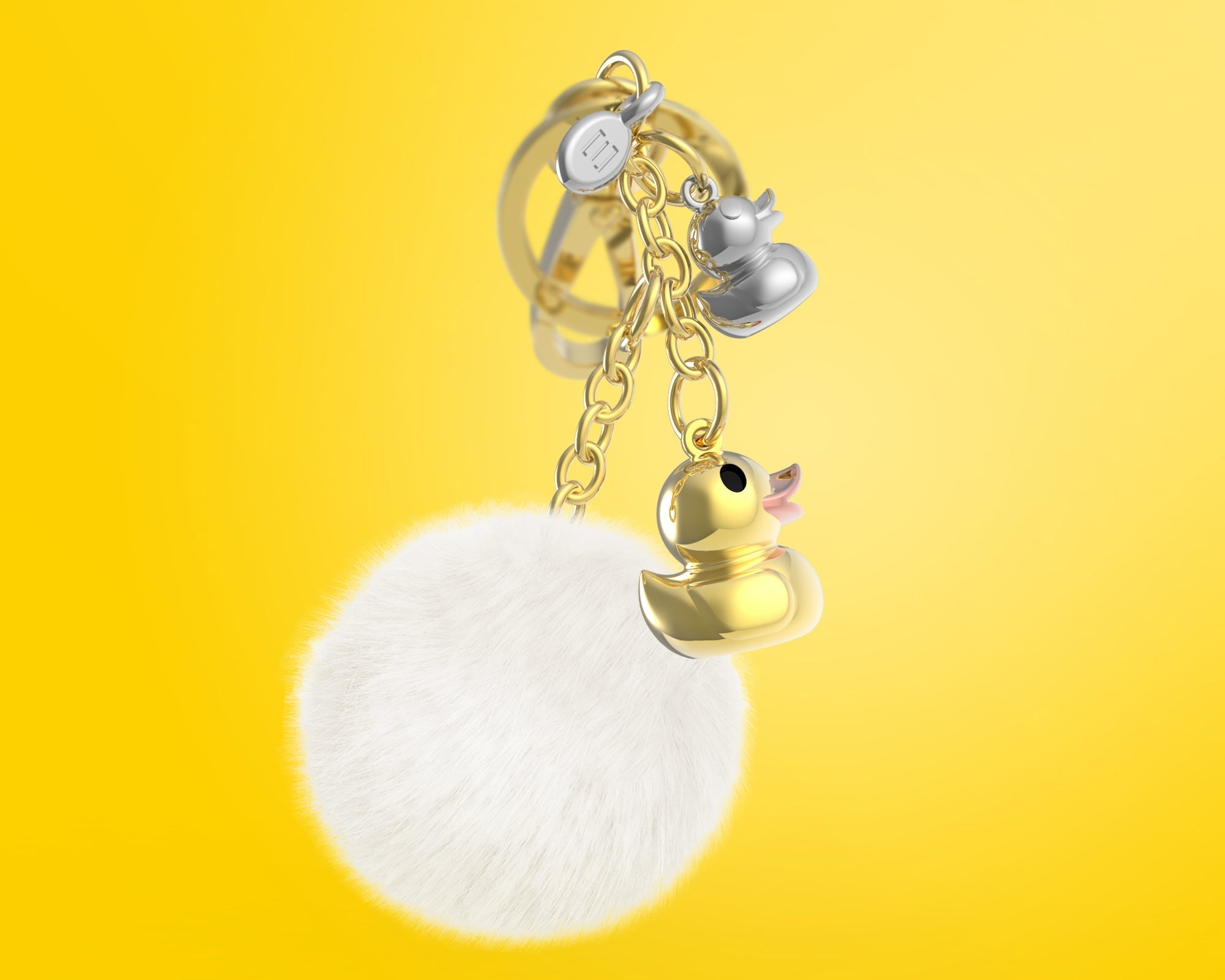 Oggetto regalo di design – Bijou de Sac Canard Doré Pompon Meta[l]morphose | Boutique d'objets cadeaux designs 