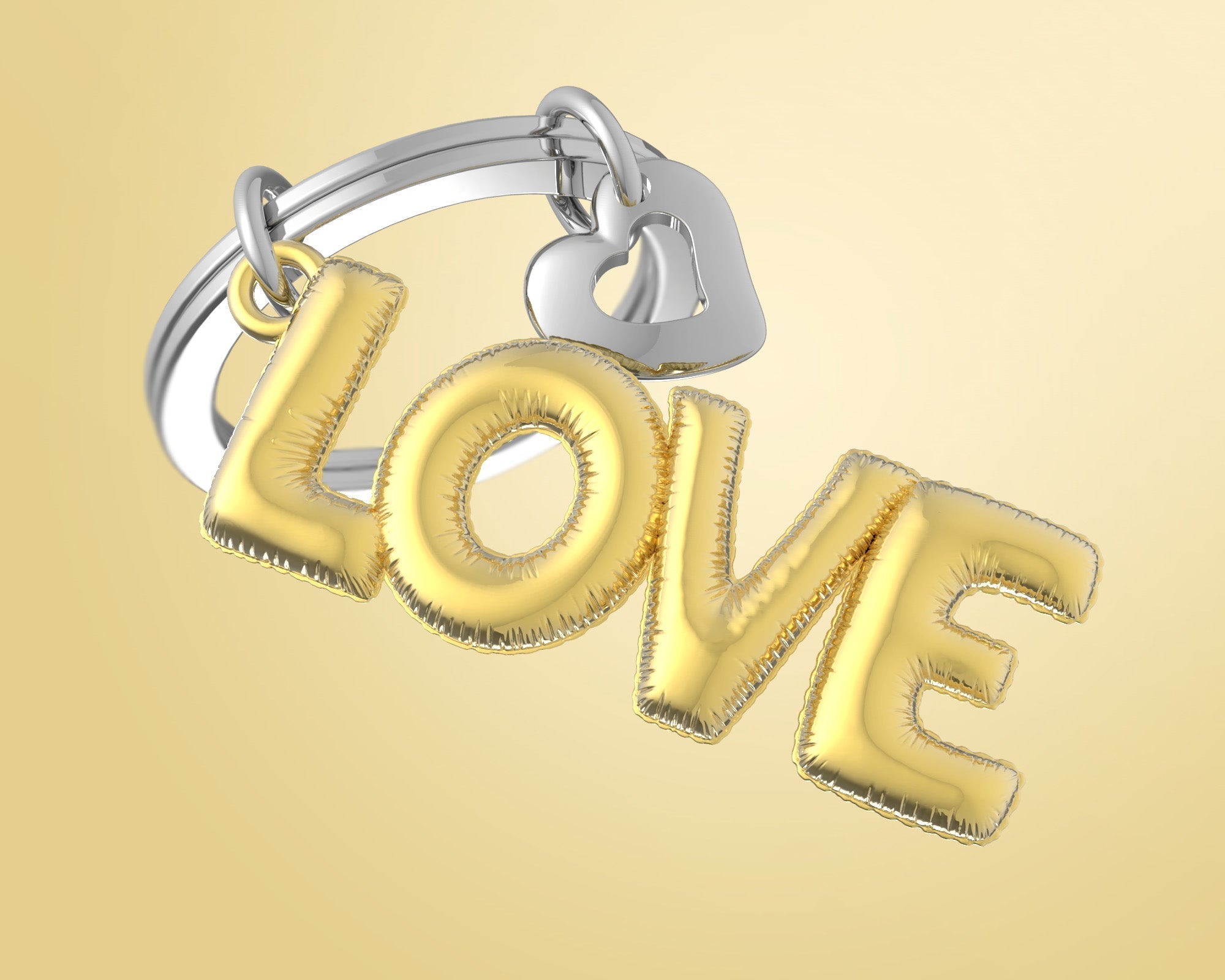 Designcadeau – Porte clés Love Ballon Gonflable Doré Meta[l]morphose | Boutique d'objets cadeaux designs 