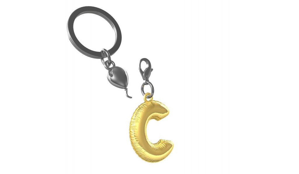 Designcadeau – porte cles alphabet ballon gonflable metalmorphose 