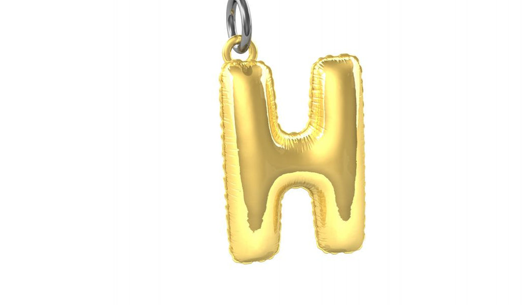 Designcadeau – porte cles alphabet ballon gonflable metalmorphose 