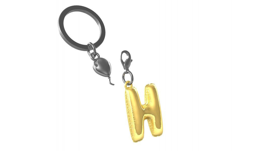 Designcadeau – porte cles alphabet ballon gonflable metalmorphose 