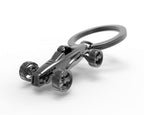 Design-lahja – porte cles voiture de course retro grise metalmorphose 