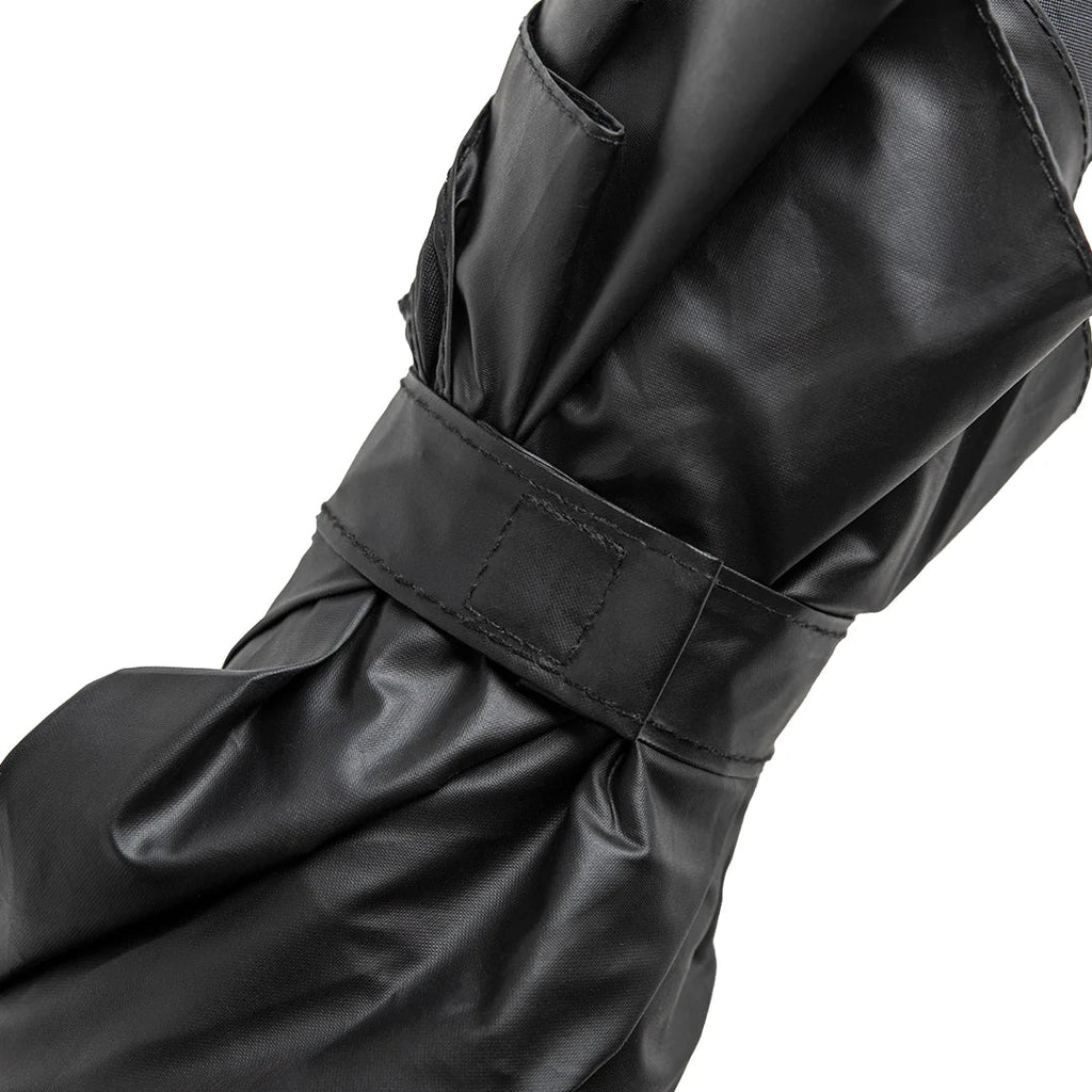The Spookula is a stylish black umbrella with a Velcro strap, perfect for any weather.