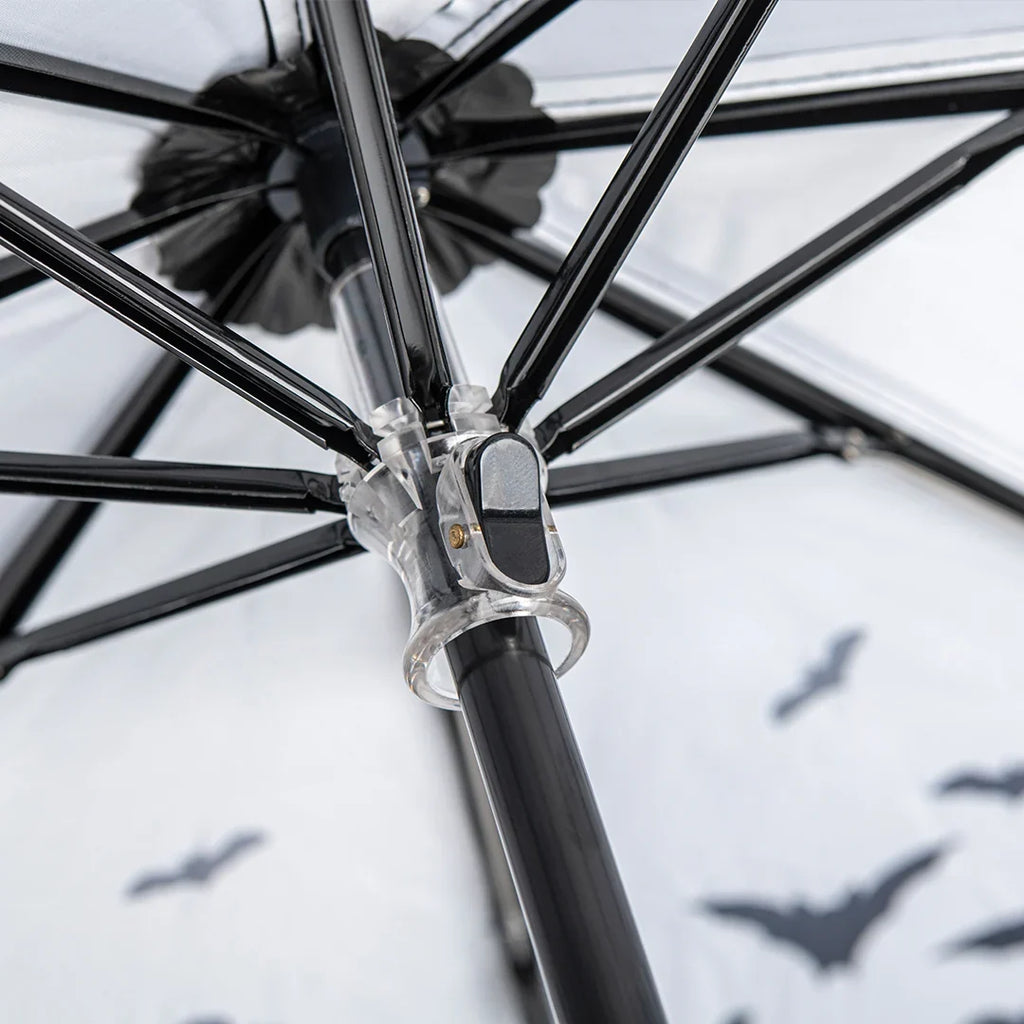 Close-up of the Spookulas black frame with bat silhouettes on the fabric.
