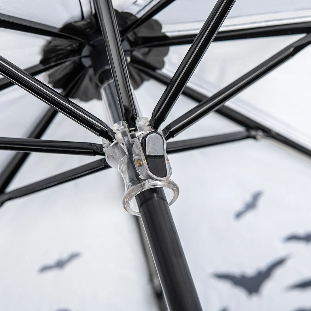 Close-up of the Spookulas black frame with bat silhouettes on the fabric.
