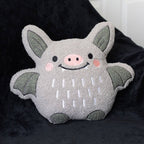 Coussin chauve-souris mignon en bouclé