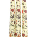 Set mit 3 cremefarbenen Kerzen mit floralem Folk-Muster