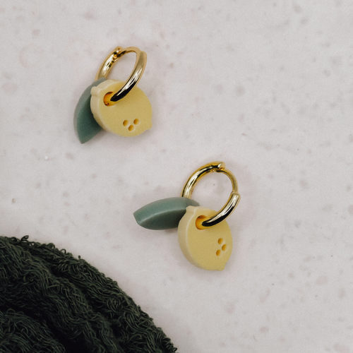 Designcadeau – boucles doreilles creoles en acrylique avec fruits au citron plaque or 18 carats 87686476