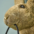Hasi Wandleuchte, goldfarbenes Polyurethanharz, 22 x 19 x 46 cm