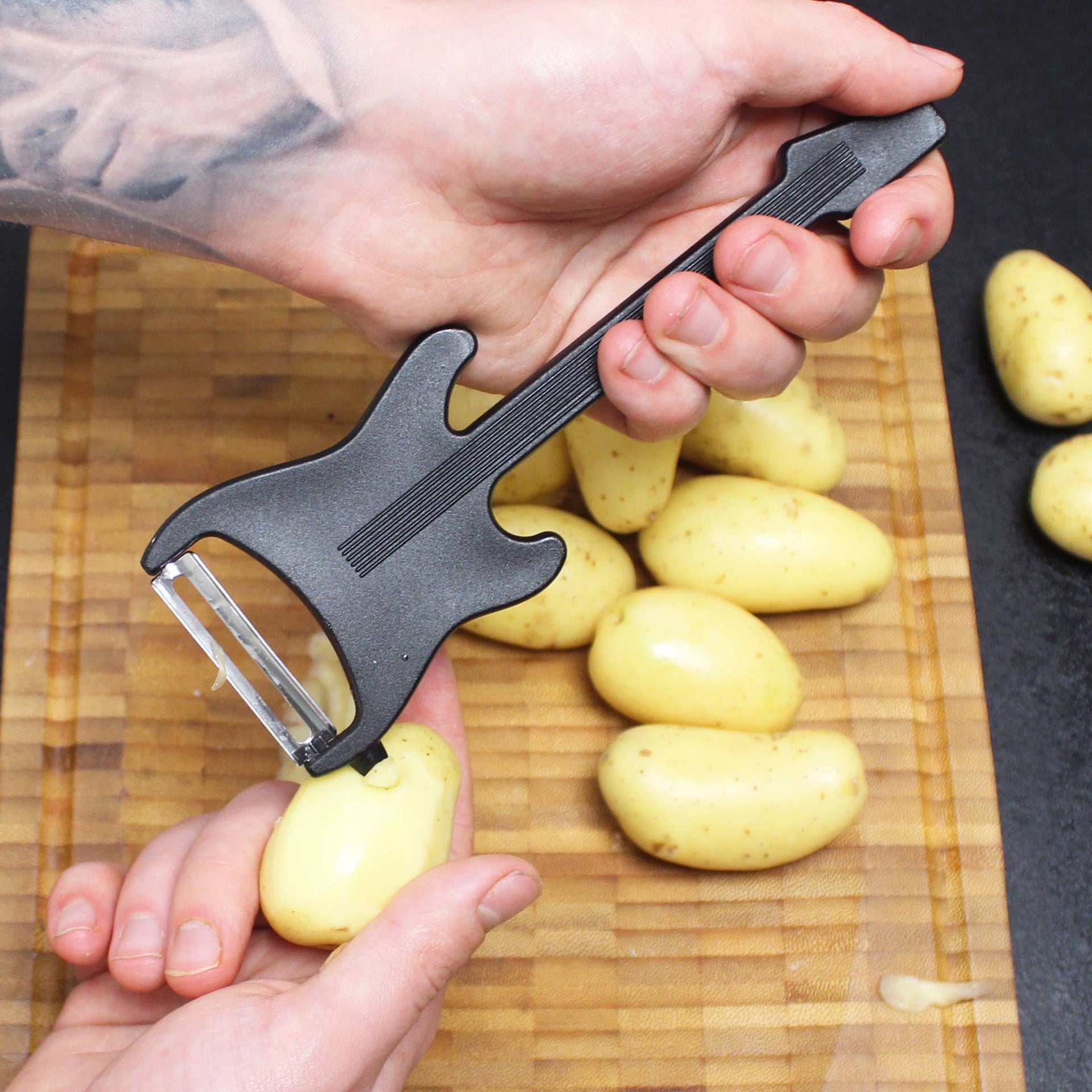 Éplucheur de légumes guitare électrique