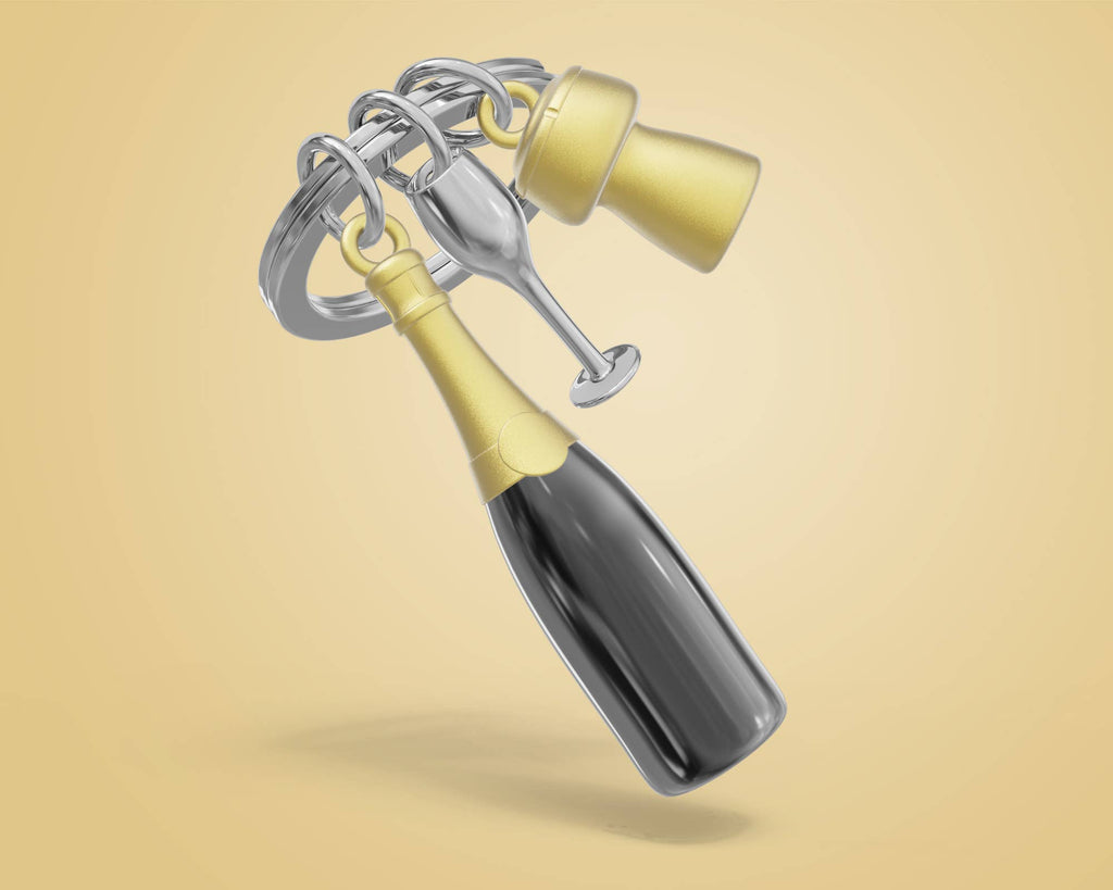 Oggetto regalo di design – porte cles bouteille de champagne metalmorphose