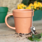 Blumentopfbecher mit Schaufellöffel