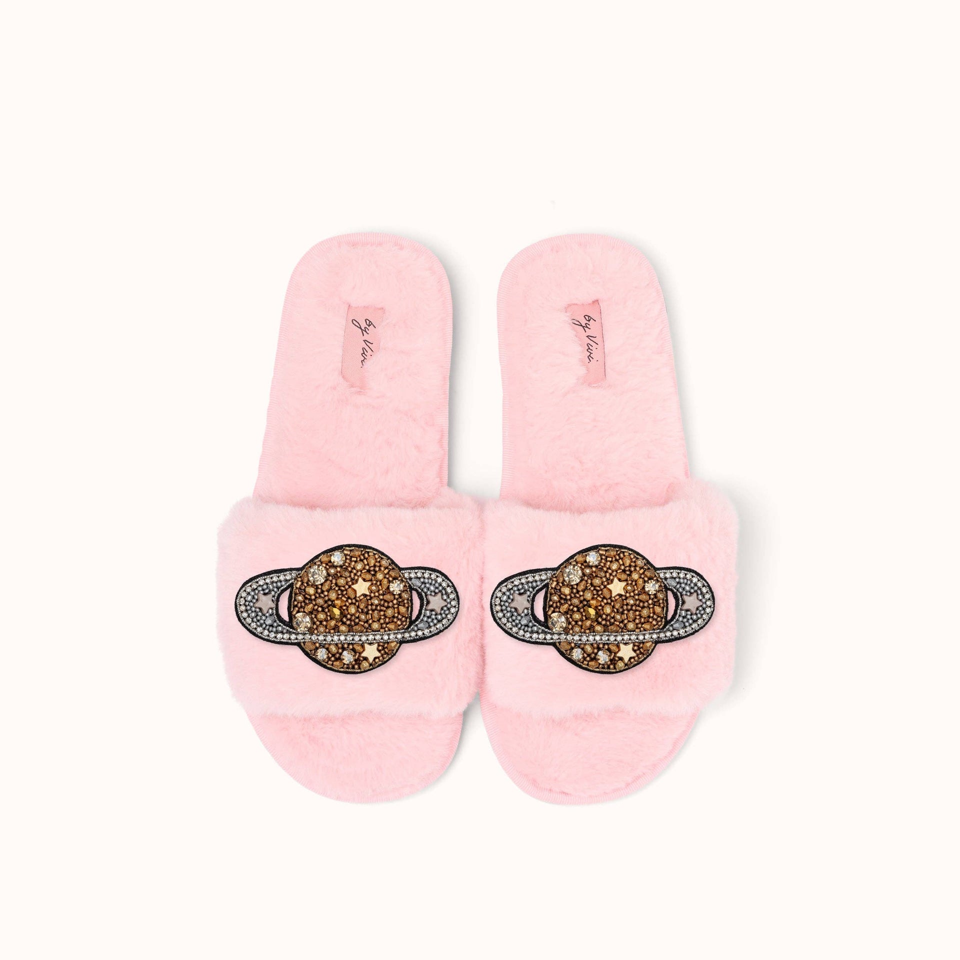 Paar Pantoffelbroschen – Saturn