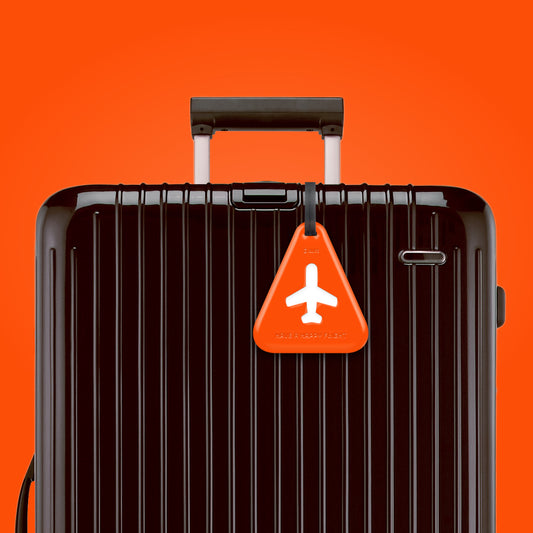 Etiquette de bagage triangle